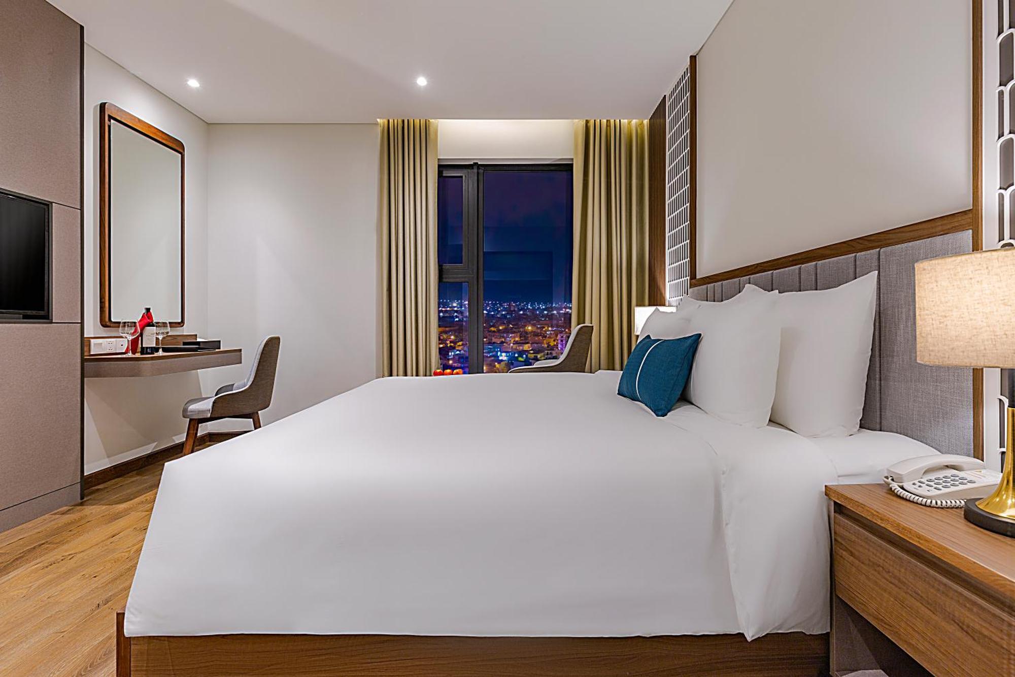 Peninsula Hotel Danang Номер фото